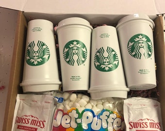 Hot chocolate with marshmallows for 4 in a Starbucks reusable to-go cups