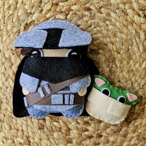 Baby Mandalorian och Yoda