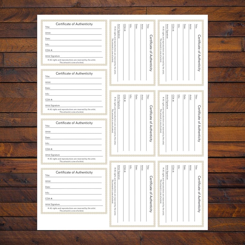 May include: A sheet of white paper with multiple rectangular certificates of authenticity. Each certificate has a decorative border and fields for title, artist, date, and COA number. The text "Certificate of Authenticity" is prominently displayed.