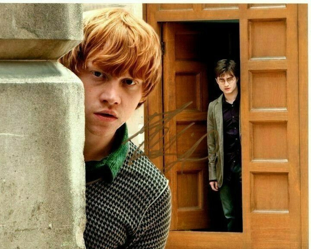 ハリーポッター ダニエル・ラドクリフ ルパート・グリント 直筆サイン入り写真　m ダニエル・ラドクリフのサイン入りハリー・ポッターとルパート