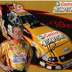 May include: A yellow and black drag racing car with the words "Castrol Edge" and "John Force" on the side. The car is driven by John Force, who is wearing a yellow and black racing suit with the words "Castrol Edge" on it.