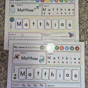 Peut inclure: Deux feuilles de travail éducatives pour enfants nommés Matthias. Les feuilles de travail comprennent des sections pour lire, épeler, construire, tracer et écrire le nom. Des illustrations colorées d'une fusée, d'un astronaute, d'un dinosaure et d'une planète sont incluses.