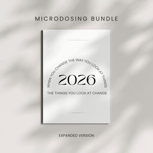 May include: A white poster with the text "MICRODOSING BUNDLE" at the top. The poster features the year "2026" in large numbers, with the text "WHEN YOU CHANGE THE WAY YOU LOOK AT THINGS" and "THE THINGS YOU LOOK AT CHANGE". The words "EXPANDED VERSION" are at the bottom.