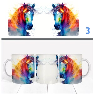 May include: Two white ceramic mugs with a colorful watercolor painting of a horse's head on each side. The horse is painted in shades of blue, red, yellow, and orange.