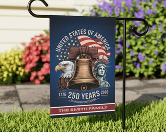 May include: A navy blue garden flag with the text "UNITED STATES OF AMERICA" and "250 YEARS 2026". The flag features an American flag, the Liberty Bell, an eagle, and the Statue of Liberty. The bottom of the flag reads "THE SMITH FAMILY".