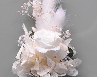 Corsage made of dried flowers and roses in cream/white for the groom, best man, etc.