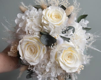 Small bridal bouquet of dried flowers with 3 stabilized roses. Dried flower bouquet in boho style