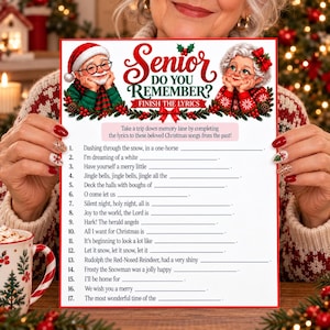 May include: A Christmas game sheet titled Senior Do You Remember? Finish The Lyrics, featuring illustrations of Santa Claus and Mrs. Claus. The paper lists seventeen fill-in-the-blank lines for classic holiday song lyrics with a red border.