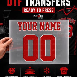 May include: A rectangular clear film sheet featuring the red text YOUR NAME above the red numbers 00. The sheet includes the text CUSTOM DTF TRANSFERS READY TO PRESS and Red Owl Graphics branding, with icons for custom colors, cold peel, and team names.