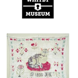 May include: A white linen sampler featuring a cross-stitch design of a cat sitting on a red cushion. The sampler is dated "1838" and has a floral border.