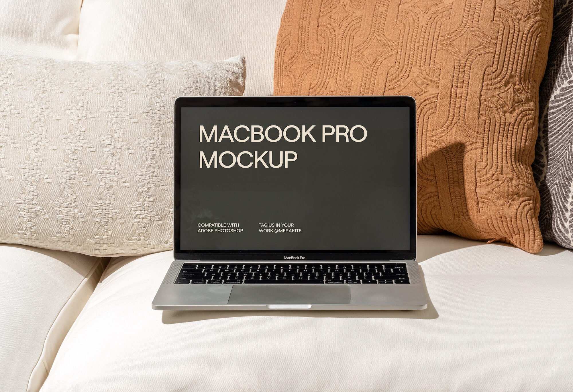 MacBook Pro Laptop PSD Mockup MacBook on White Sofa Interior