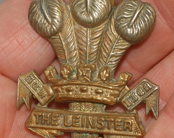 WW1 Leinster Regiment Cap Badge: Brass & Silvered, Royal Canadian POW