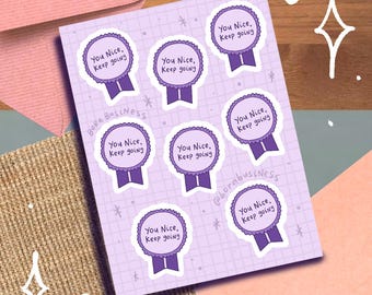 May include: A sheet of purple and white stickers with the text "You Nice, Keep going" on each sticker. The stickers are shaped like a ribbon.