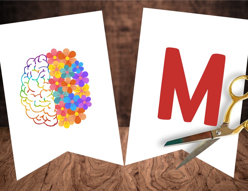 May include: Two white banners with a brain on the left and the letter M on the right. The brain is half filled with colorful flowers. A pair of gold scissors is cutting the banner with the letter M.