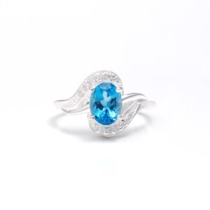 Blue Topaz Ring: Oval Gemstone, Sterling Silver Anniversary Ring