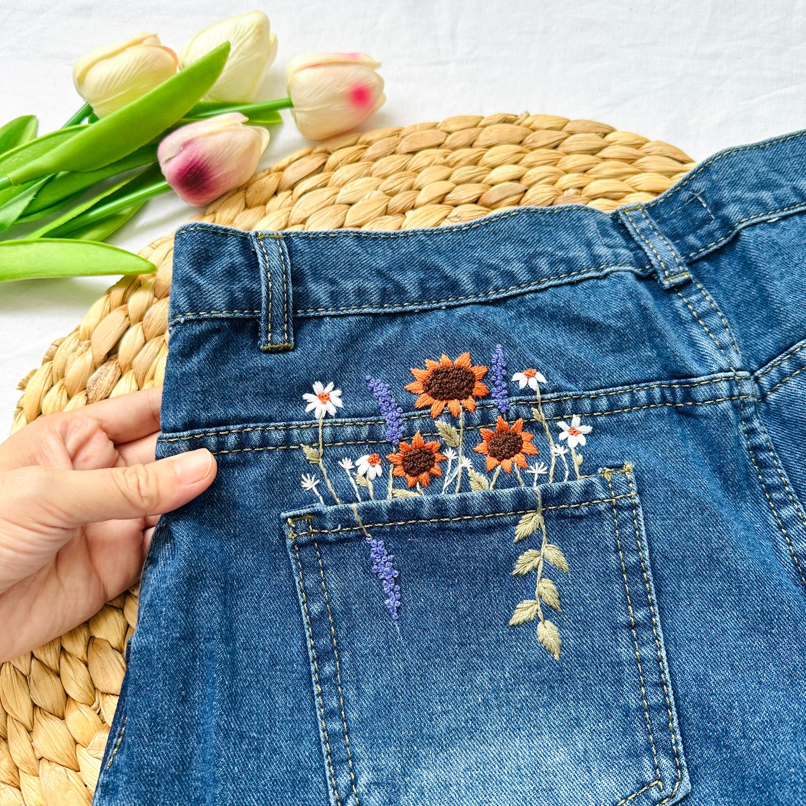 Embroidered back pocket best sale jeans