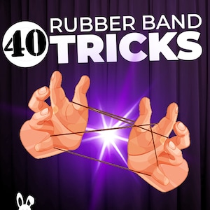 May include: Two hands are shown holding a rubber band, with the text "RUBBER BAND 40 TRICKS" above them. The hands are against a purple background.