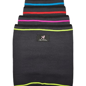 May include: A set of four black knee support sleeves with neon green, pink, red, and blue stripes. The sleeves have a small label that says "My K9 Crew".