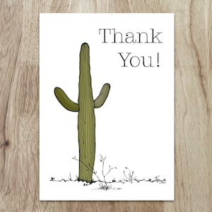 Carte de remerciement Saguaro - un sympathique cactus semble ouvrir les bras et crier : « Merci ! en votre nom ! Blanc à l'intérieur pour votre message.