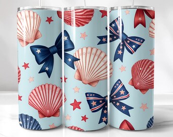 May include: A cylindrical tumbler with a light blue background featuring a repeating pattern of red and white seashells, dark blue bows with white stars, and small red and light pink stars. The design includes a clear lid and a straw.