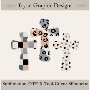 May include: Three cross-shaped graphic designs with the text Tryon Graphic Designs and Sublimation-DTF-X-Tool-Cricut-Silhouette. The left cross has a blue, beige, and black chequered pattern. The centre cross features a blue and beige leopard print. The right cross has blue and black polka dots.