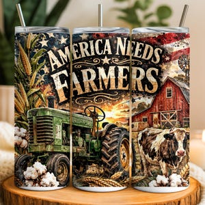 May include: A cylindrical tumbler with a metal straw featuring a graphic print of a green tractor, a red barn, a cow, and wheat stalks against an American flag background. The text AMERICA NEEDS FARMERS is printed in large, bold, dark lettering.
