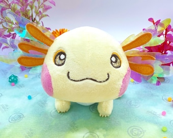 Peluche de ajolote amarillo brillante