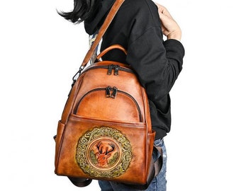 Handmade Brown Leather Backpack with Soft Arcuate Adjustable Shoulder Strap - Vintage Look, Spacious Compartments, and Applique Prints
