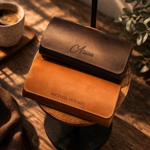 May include: A set of three ceramic mugs with a speckled, matte finish. The mugs are in shades of cream, light gray, and dark gray. Each mug has a simple, minimalist design, perfect for coffee or tea.
