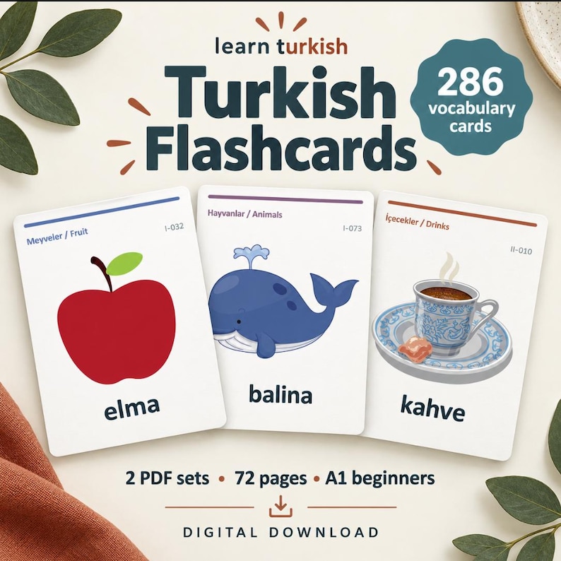 May include: A set of 286 Turkish vocabulary flashcards for beginners, featuring three sample cards displaying an apple with the word elma, a whale with the word balina, and a cup of coffee with the word kahve, labeled as 2 PDF sets and 72 pages.