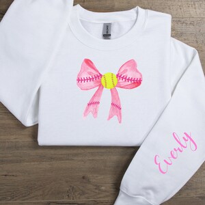 Coquette Aesthetic Pink Bow Softball Custom Name Sweatshirt Cute Coquette Personalized Trendy Crewneck for Women, Chic Daughter Gift for Her