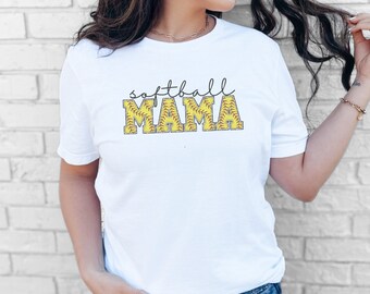 May include: White t-shirt with the text "softball MAMA" in yellow and red. The letters are outlined in black and filled with a softball pattern.