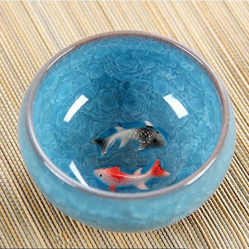 thumbnail interactive-video image 1 of Small Green Ceramic Tea Cup With Fish Relief - 50ml Chinese Style 1 of 4