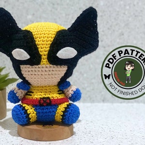 May include: Crochet amigurumi pattern for a yellow and blue Wolverine character. The pattern is a digital download and does not include the finished doll. The pattern is for a PDF download. "PDF Pattern Digital File Not Finished Doll"