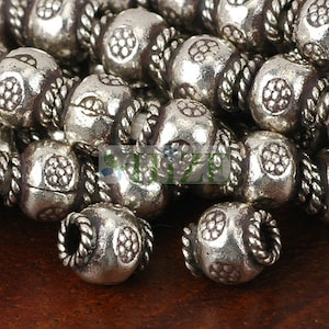 HIZE SB550 Thai Karen Hill Tribe Silver Tribal Ethnic Daisy Flower Rotund Barrel Oval Beads 7mm (10)