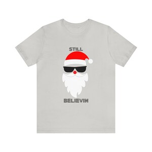 Christmas T-shirt Funny Shirt Christmas Tee Christmas gift Still Believe T Shirt