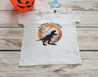 Baby Boys or Girls Halloween Spookysauras T-Rex T-Shirt, Keepsake Halloween Gift, Dinosaur T-Shirt, Personalised Baby Clothes, Slogan Tshirt