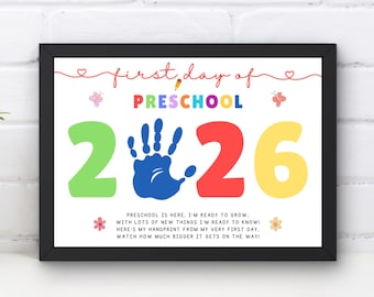 May include: A framed sign with the text first day of PRESCHOOL and the year 2026, where the zero is replaced by a blue handprint. The design includes a pencil, butterflies, flowers, and the text: PRESCHOOL IS HERE, I'M READY TO GROW.