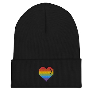 May include: Black beanie with a rainbow pixelated heart embroidered on the front.