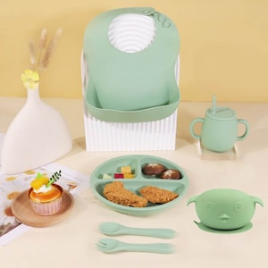 Coffret Repas Bebe, Lot de 6 pièces, Vaisselle pour Bébé Set Silicone avec Ventouse Assiette Bol Fourche Cuillère Bavoir et Tasse, Sans BPA