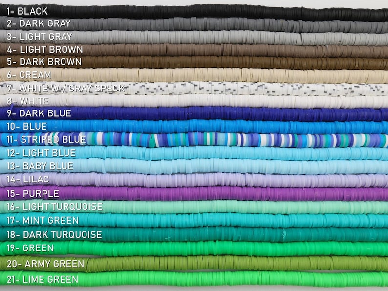 May include: A collection of 21 different colours of polymer clay beads. The beads are arranged in rows, with each row representing a different colour. The colours include black, dark grey, light grey, light brown, dark brown, cream, white with grey speckles, white, dark blue, blue, striped blue, light blue, baby blue, lilac, purple, light turquoise, mint green, dark turquoise, green, army green, and lime green.