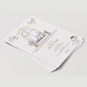 May include: A stack of white invitation cards with an Eid Mubarak theme. The cards feature a watercolor illustration of a mosque, crescent moon, and lanterns. Text includes "Eid Mubarak", "Ismail & Family", and event details.