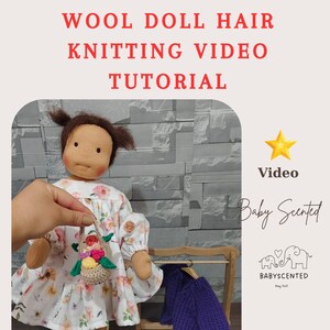 May include: A handmade doll with brown wool hair and a floral dress is featured in a video tutorial. The doll holds a miniature basket of flowers. The text "WOOL DOLL HAIR KNITTING VIDEO TUTORIAL" is displayed at the top of the image.