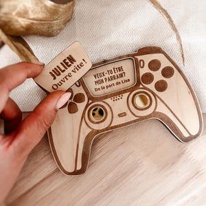 Surprise request box in the shape of a game controller, request for godfather, godmother, uncle announcement, etc.