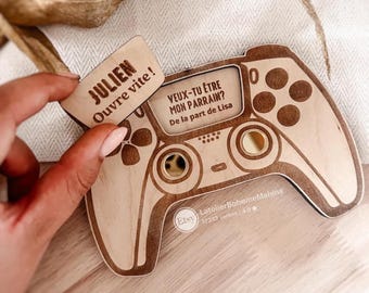 Surprise proposal box in the shape of a game controller, for asking someone to be a godfather, godmother, or uncle, etc.