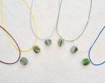 Handmade unique Natural Norfolk seaglass necklace, spiral cage spring encased pendant necklace, Handcrafted seaglass Gift