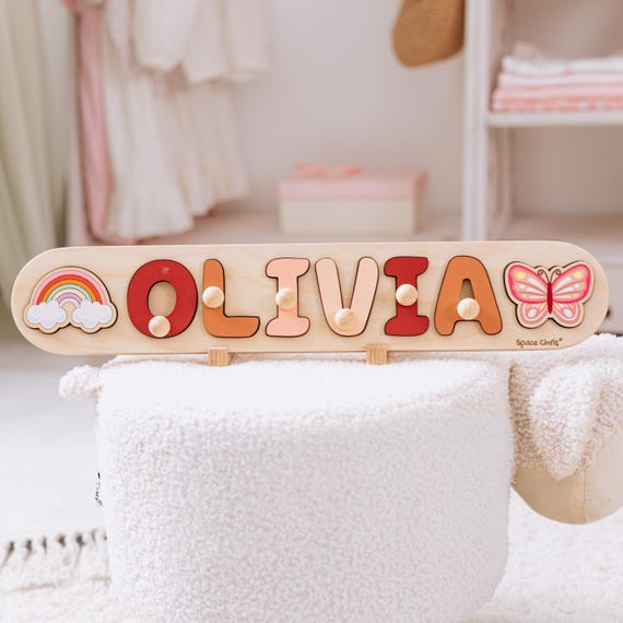 521 favorites on a rainbow name puzzle proves this cheerful, colorful wooden toy hits the sweet spot of personal + practical + adorable.