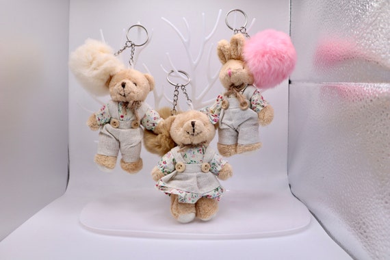 Fluffy rabbits and teddy bears on sale