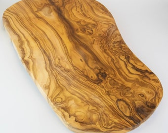 Large and rustic cutting board made of olive wood with a length of 55-60 cm