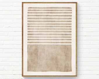 May include: A rectangular wall art print in a wooden frame featuring a beige and off-white design. The upper portion displays a series of horizontal stripes, while the lower portion consists of a solid, textured beige block of color.